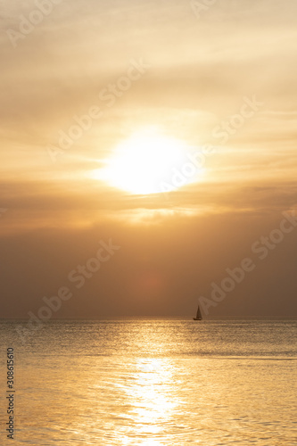 A sailboat on Lake Michigan at sunset © Jennifer