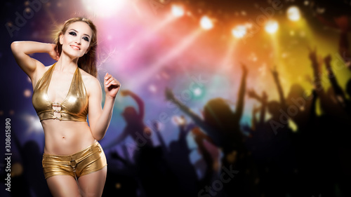 attractive woman dancing in front of a club background