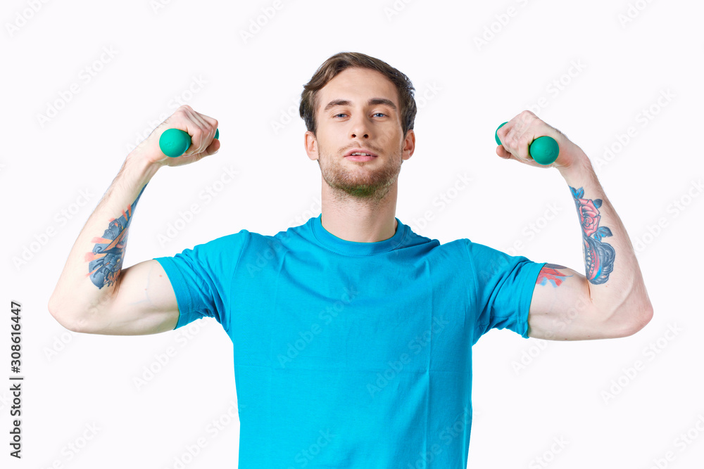 young man holding a ball young man holding a ball