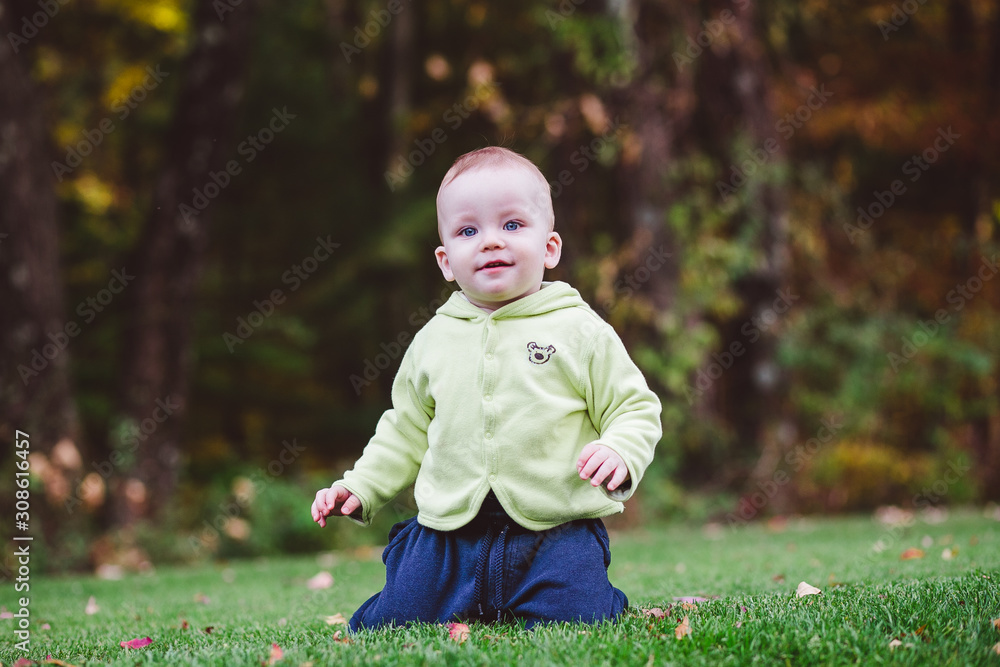 little child playing in the park little child playing in the park