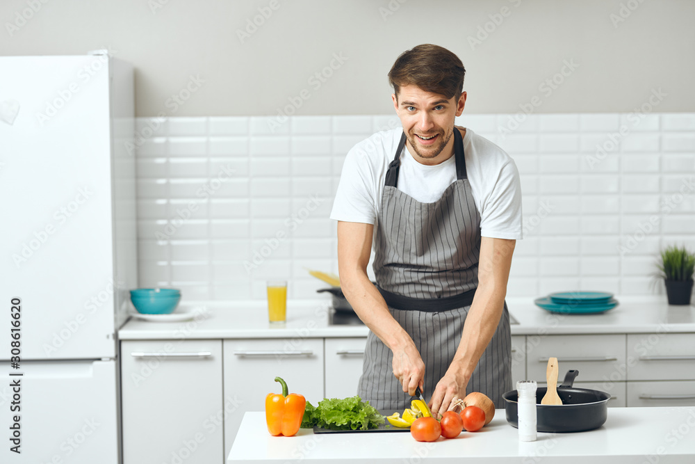 man preparing food in the kitchen man preparing food in the kitchen
