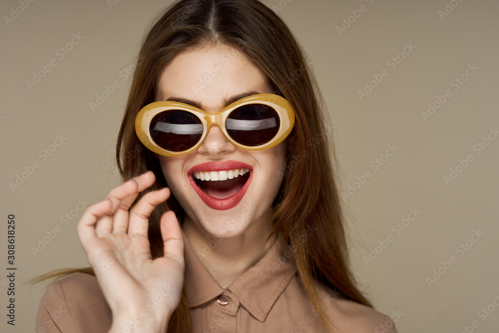portrait of young woman in sunglasses