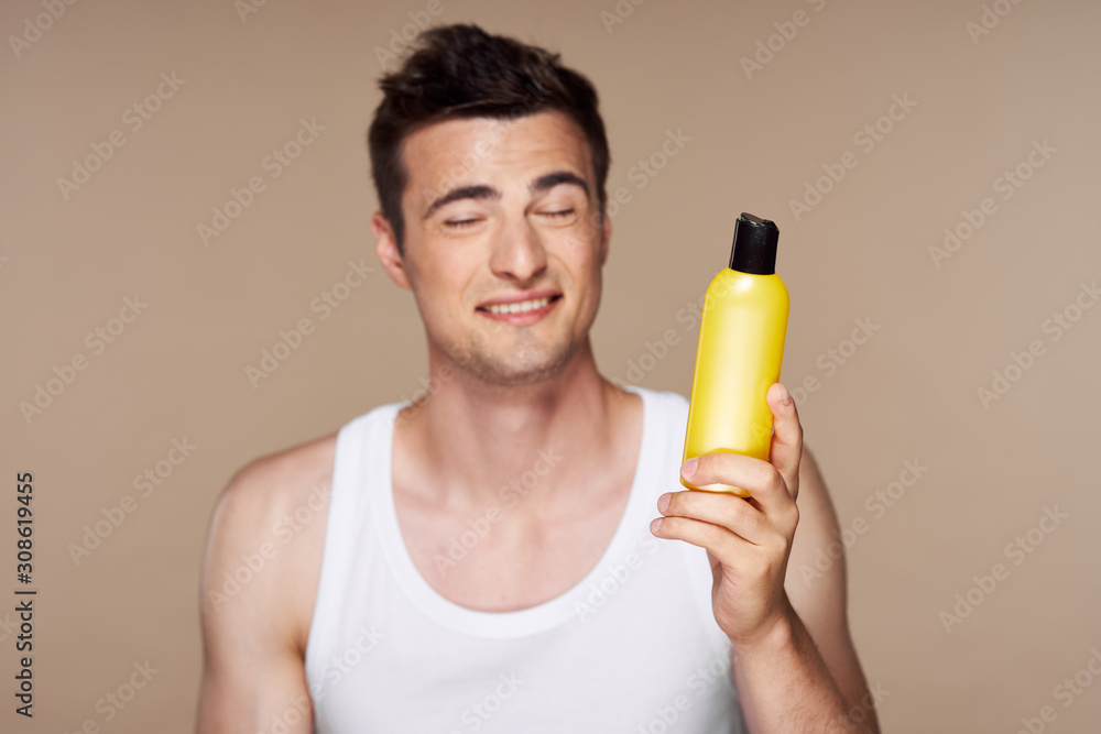 young man drinking orange juice