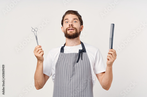 young man with knife and fork isolated on white