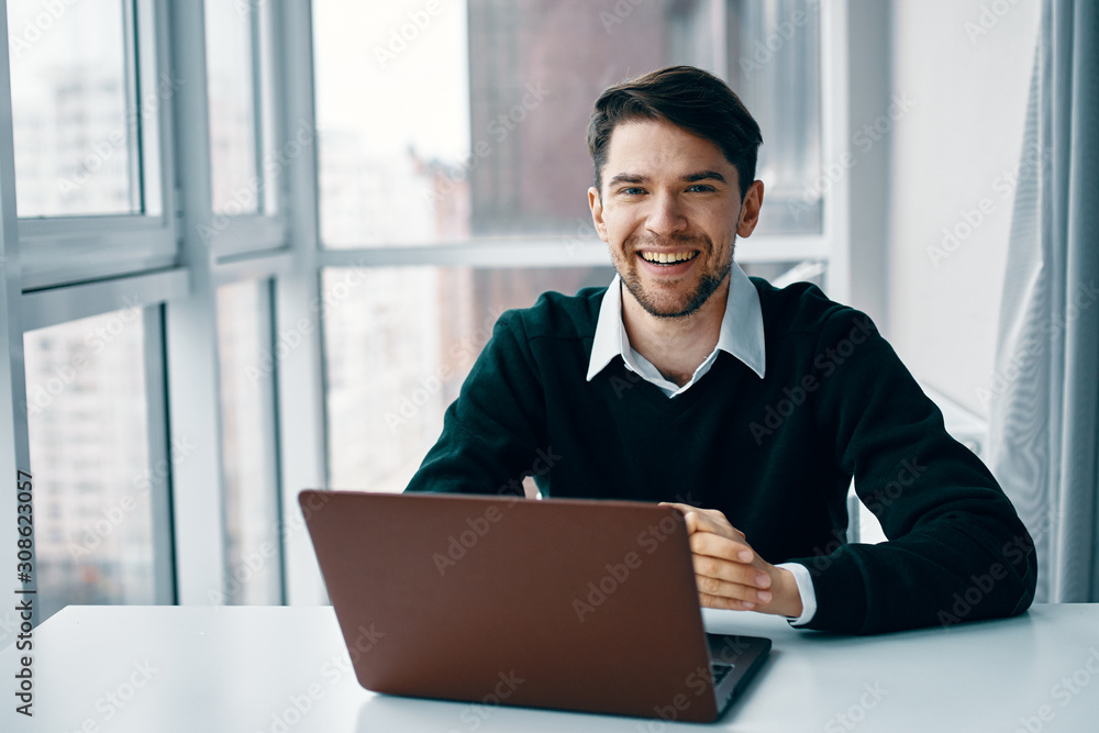 businessman working on laptop in office businessman working on laptop in office