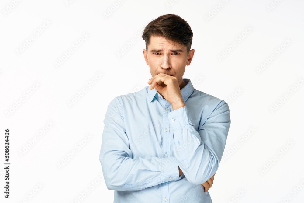 young man talking on the phone isolated on white young man talking on the phone isolated on white