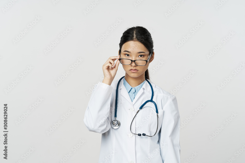 portrait of a female doctor with stethoscope portrait of a female doctor with stethoscope