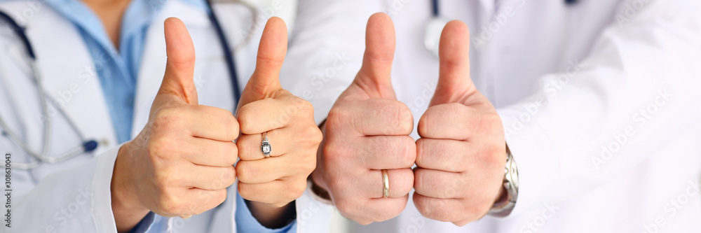 Group of doctor hands show OK or confirm sign Group of doctor hands show OK or confirm sign