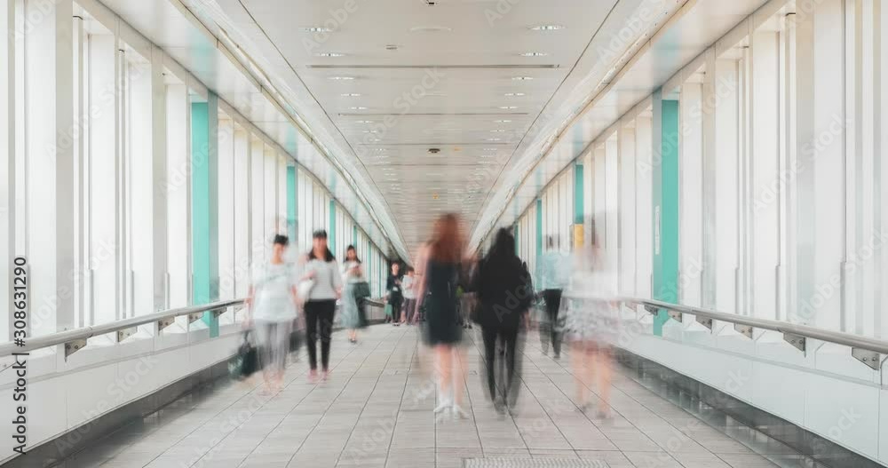 Time lapse of passenger walking on the footbridge walkway. Time lapse of passenger walking on the footbridge walkway.