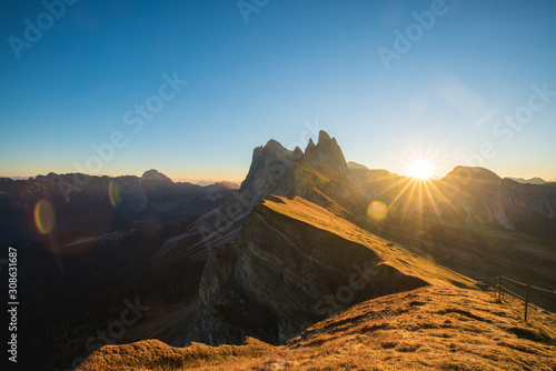 Sunrise landscapes in Seceda with clear blue sky in Dolomites, South Tyrol, Italy