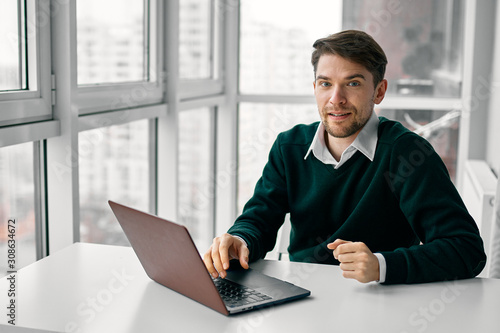 businessman working on laptop in office
