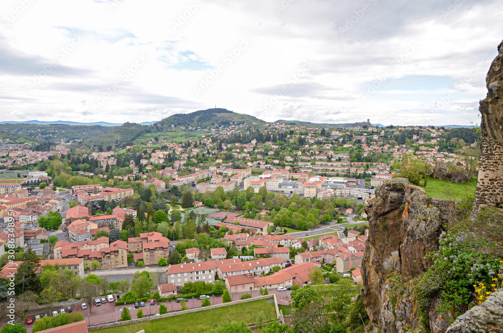 The hill view on orange roofs of le Puy-en-Velay city in France