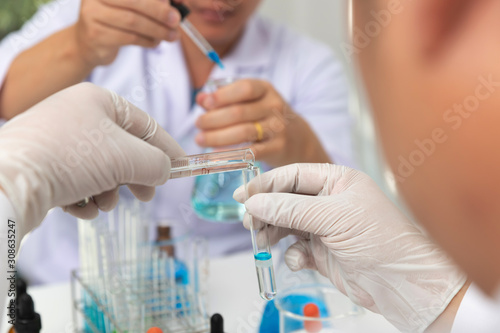 Research and development concept, Laboratory scientist working at lab with test tubes about medicine