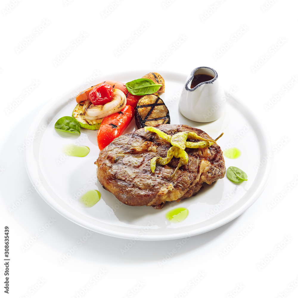 Macro Shot of Pork Neck Steak with Grilled Vegetables Isolated