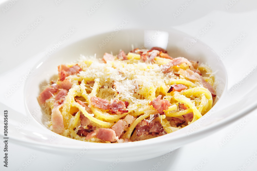 Macro Photo of Spaghetti Carbonara with Grated Parmesan and Bacon
