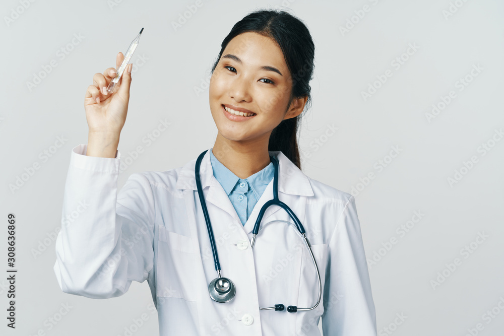 young doctor with stethoscope isolated on white young doctor with stethoscope isolated on white