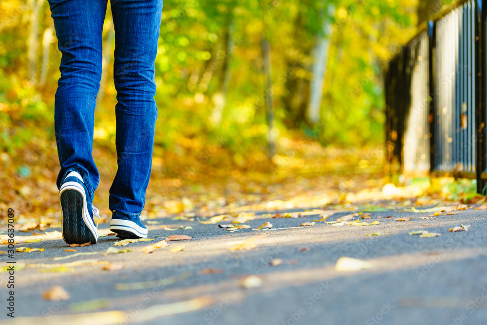 Person wearing casual sneakers outdoor Person wearing casual sneakers outdoor