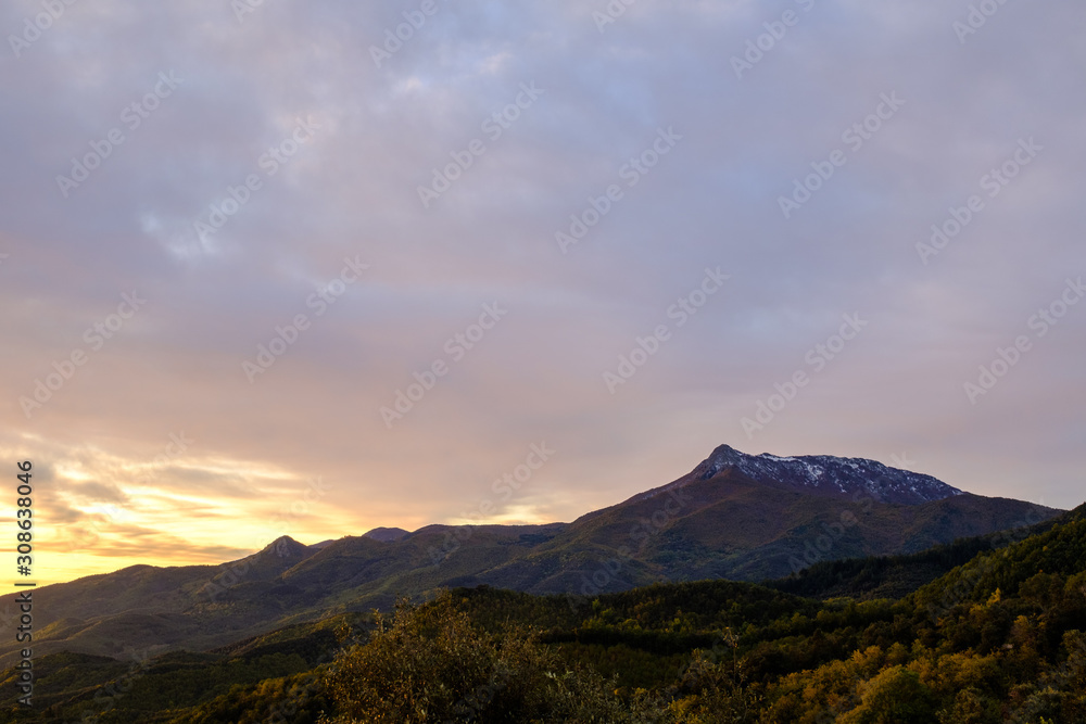 Sunrise morning landscape on a green forest mountain valley in Catalonia mountains Sunrise morning landscape on a green forest mountain valley in Catalonia mountains