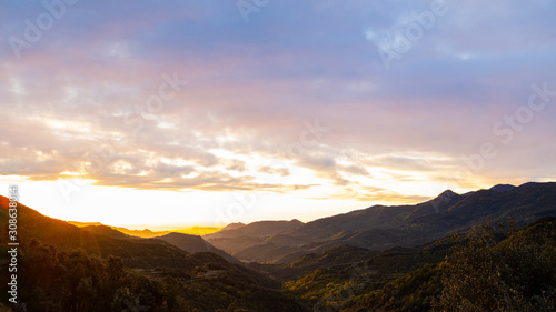 Sunrise morning landscape on a green forest mountain valley in Catalonia mountains © jordieasy