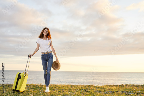 woman with suitcase © SHOTPRIME STUDIO