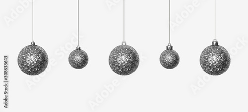 Set of beautiful silver glittering Christmas balls made of sparkles hanging on shiny thread. Christmas decoration from sequins for festive mood. Desidn element isolated on white. Realistic 3D vector