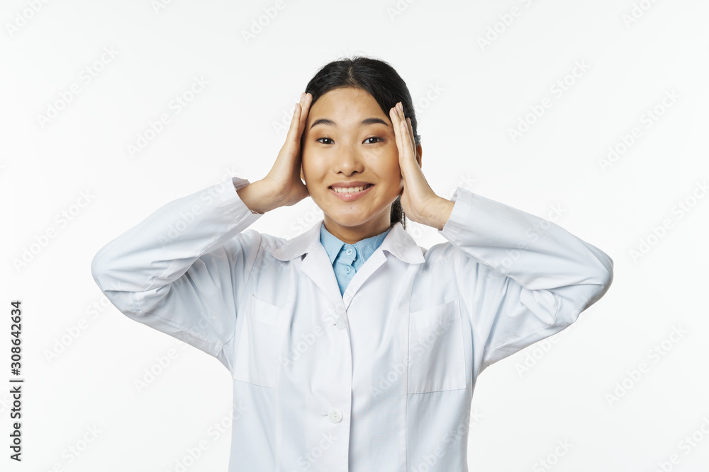 portrait of a young man with hands on his head
