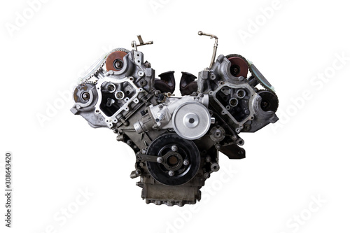 V-shaped engine with six or eight cylinders made of aluminum and metal during repair or replacement on a guarantee on a white isolated background.