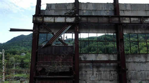 Pan to Abandoned Power Plant Building photo