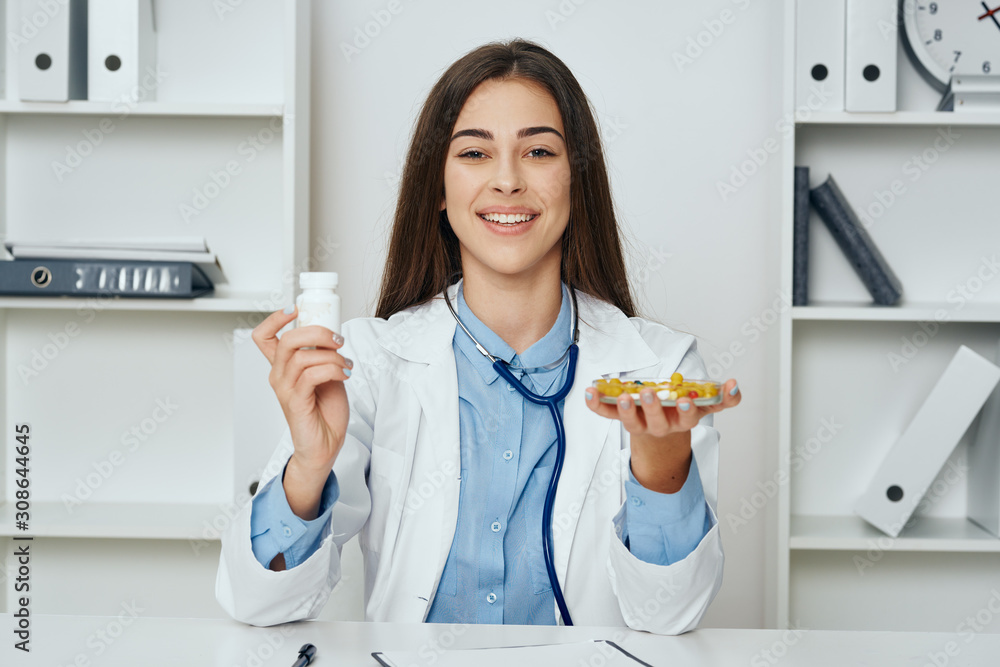 young doctor holding an apple