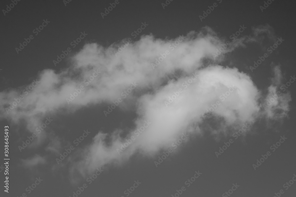 White clouds on a sky background. Black and white White clouds on a sky background. Black and white