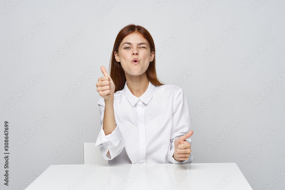 business woman sitting at desk with laptop business woman sitting at desk with laptop