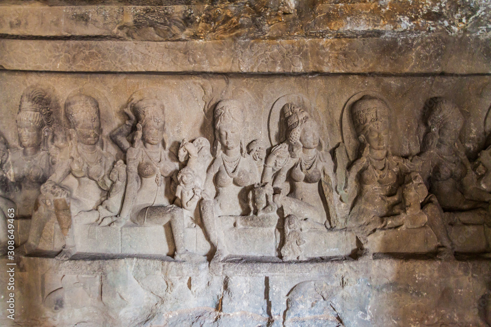 ELLORA, INDIA - FEBRUARY 7, 2017: Carvings in a cave monastery in Ellora, Maharasthra state, India