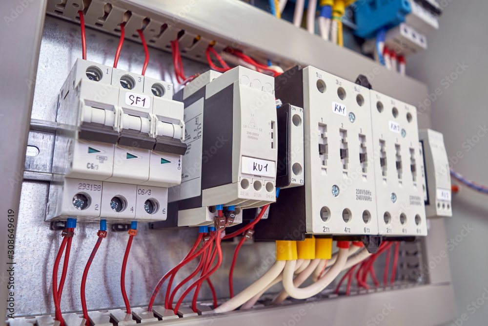 The circuit breaker, phase control relays and power contactors are