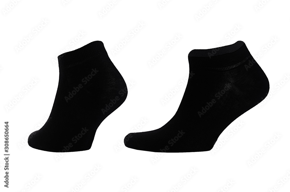 Blank black cotton sport short socks on invisible foot isolated on white background as mock up for advertising, branding, design, front side, side view, template. Blank black cotton sport short socks on invisible foot isolated on white background as mock up for advertising, branding, design, front side, side view, template.