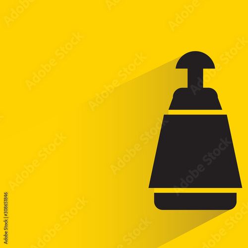 beverage, alcohol bottle with drop shadow yellow background
