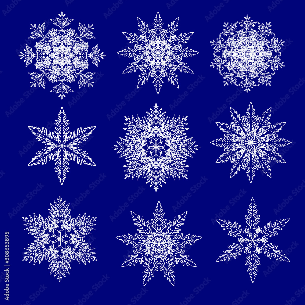 Set of lace snowflakes on a blue background. Vector illustration. Set of lace snowflakes on a blue background. Vector illustration.