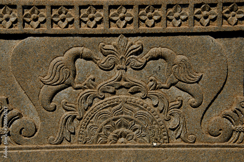 Carving details on the outer wall of the Vitthal Rukhmini Temple, Palashi, Parner, Maharashtra, India photo