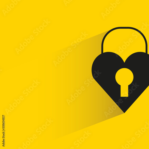 heart key with drop shadow on yellow background