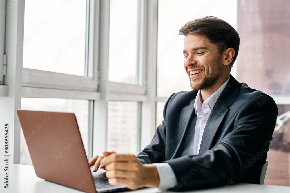 businessman working on laptop in office businessman working on laptop in office