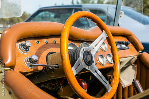 steering wheel of a vintage car © Ali Magsi
