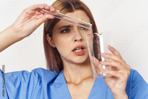 young woman with a glass of water