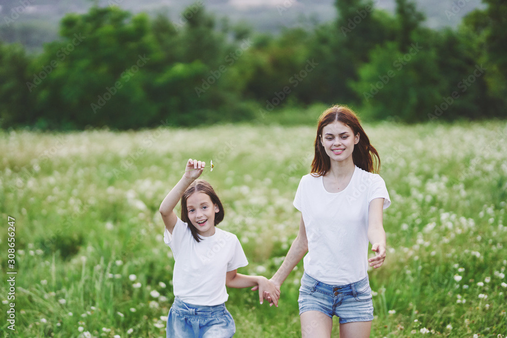 mother and daughter in the park mother and daughter in the park