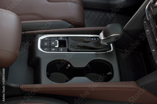 Interior of new modern car with automatic transmission. Modern transportation.