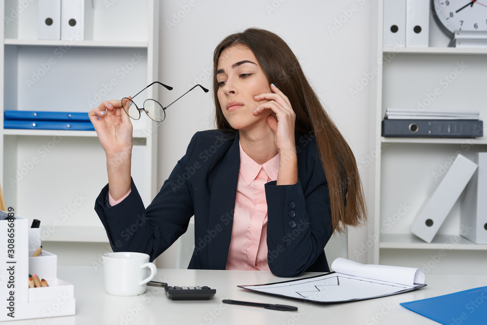 businesswoman talking on phone in office businesswoman talking on phone in office