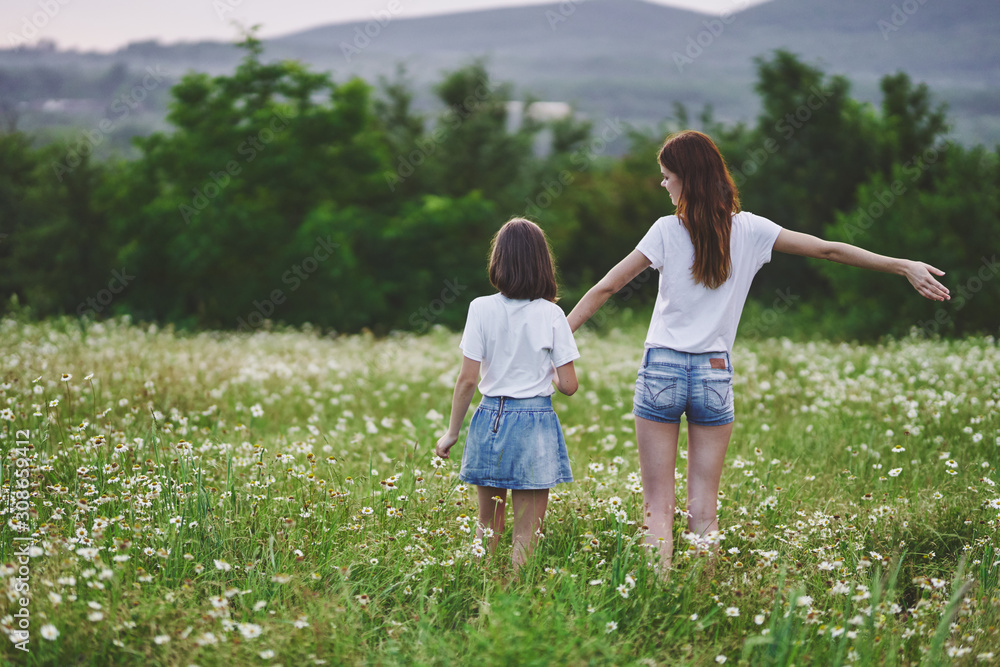 mother and daughter in the field