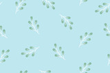 Seamless pattern of cute leaves on light blue background