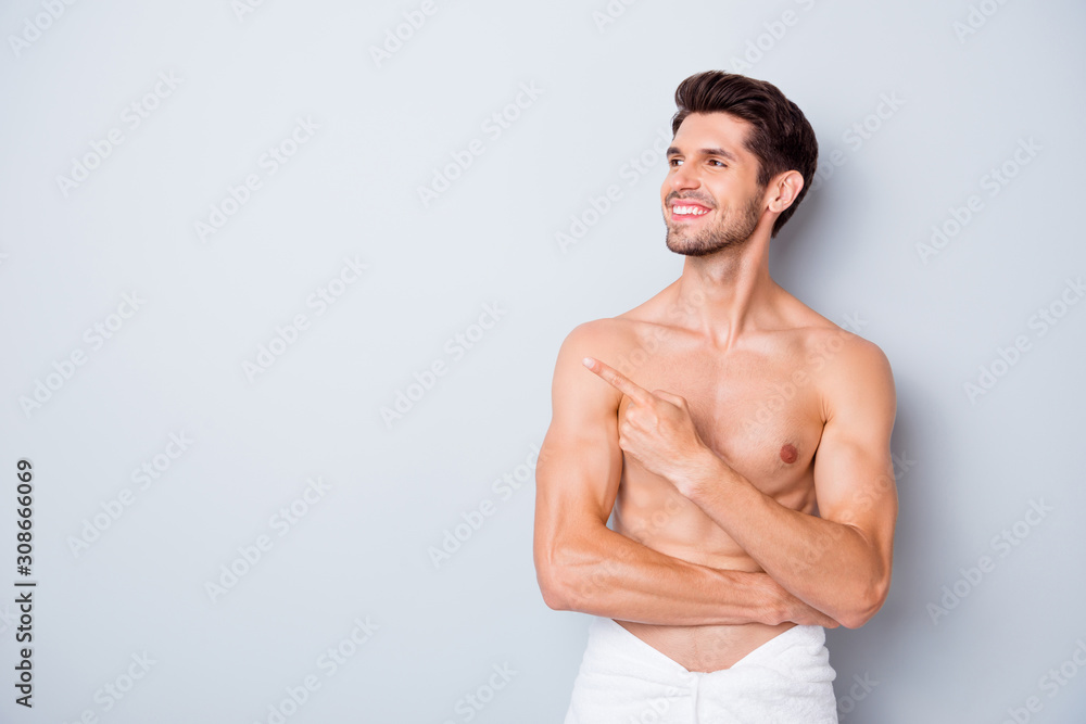 Profile side photo of handsome guy enjoy spa salon skincare treatment point index finger copyspace isolated wear white towel over grey color background Profile side photo of handsome guy enjoy spa salon skincare treatment point index finger copyspace isolated wear white towel over grey color background