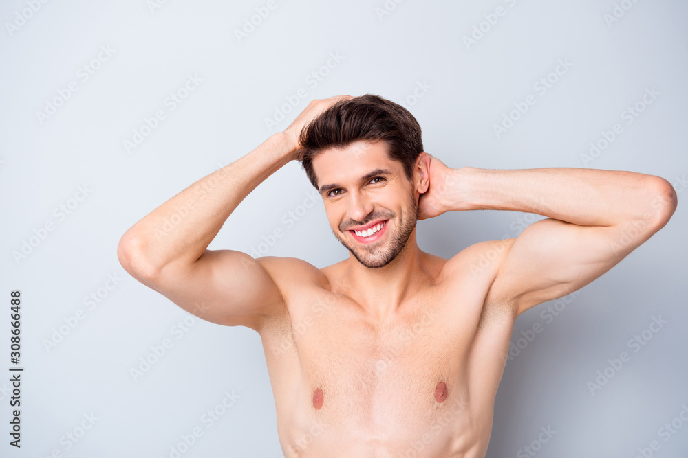 Perfect anti dander gel. Attractive joyful guy look mirror touch his shiny clean haircut after spa salon procedure hairstylist perfect solution isolated over grey color background Perfect anti dander gel. Attractive joyful guy look mirror touch his shiny clean haircut after spa salon procedure hairstylist perfect solution isolated over grey color background