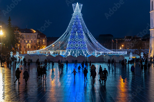 Christmas tree - Queen and bell tower in Cathedral Square. Vilnius, the capital of Lithuania, waiting for Christmas. The junction of 2019 and 2020 year. 