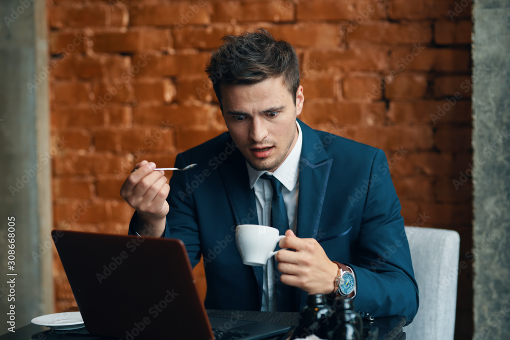 businessman drinking coffee in cafe businessman drinking coffee in cafe